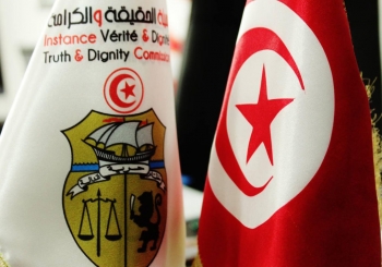  Two flags representing the Specialized Criminal Chambers in Tunisia.