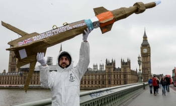 Amnesty International activist in protest against UK arms sales to Saudi Arabia in 2016